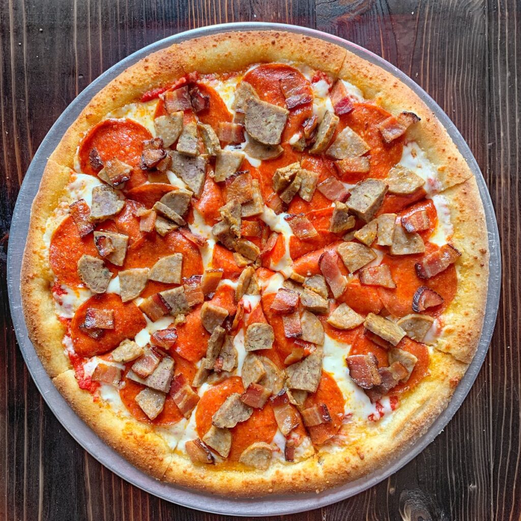 The Bowery Craft Beer & Pizza in Fullerton Pepperoni, Bacon, Sausage, and Cheese Pizza